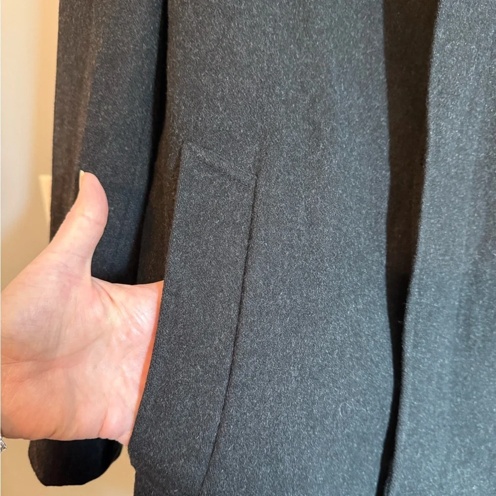C. Comberti black wool blend coat.